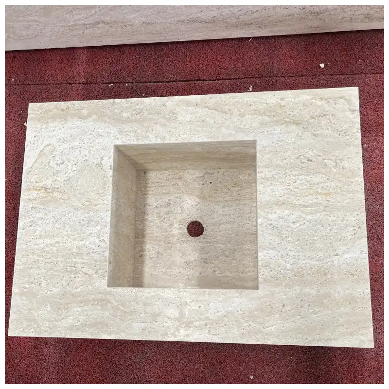 Lavelli integrati in travertino avorio